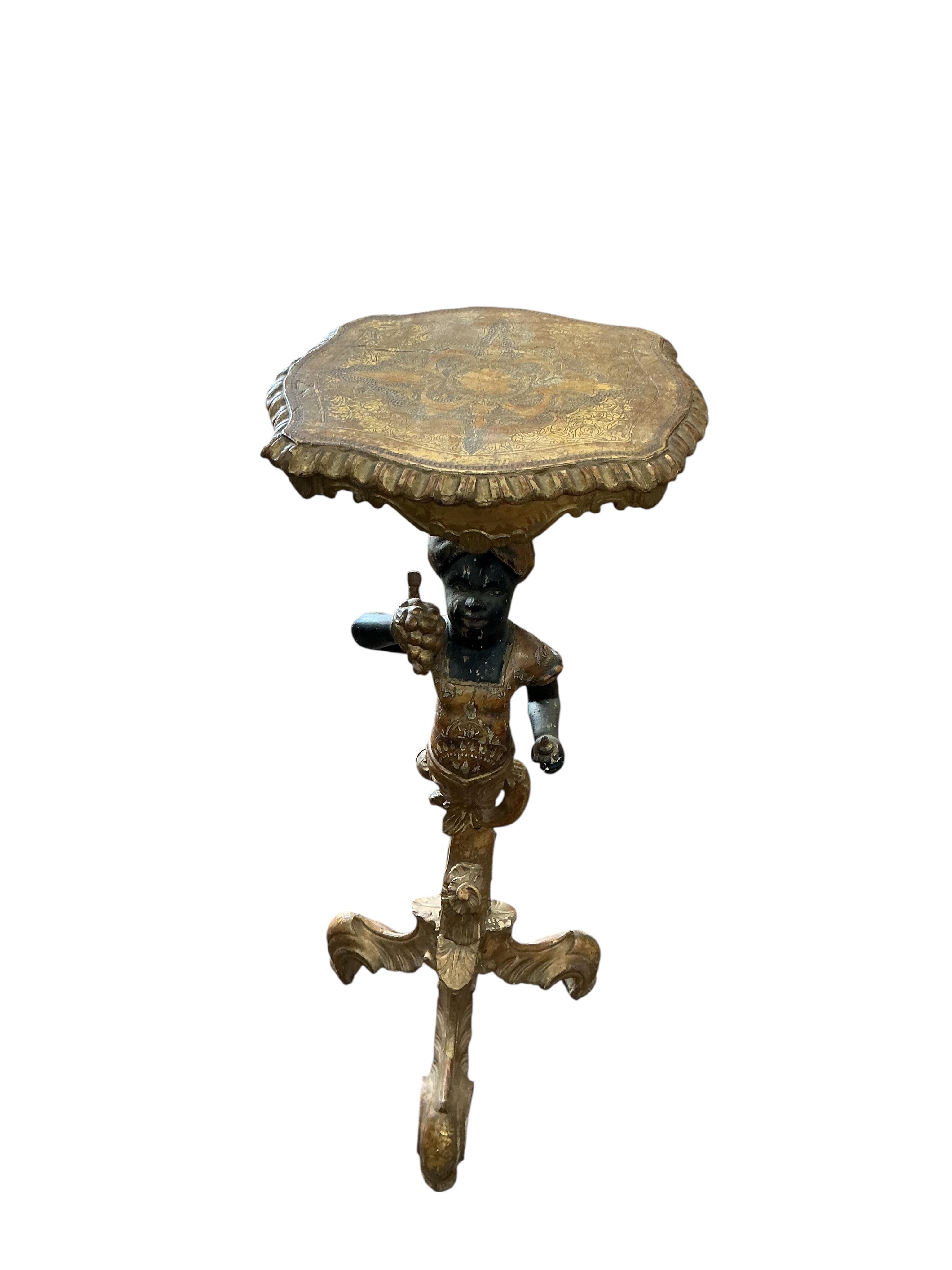 A Venetian polychrome carved wood Blackamoor torchere stand, height 96cm